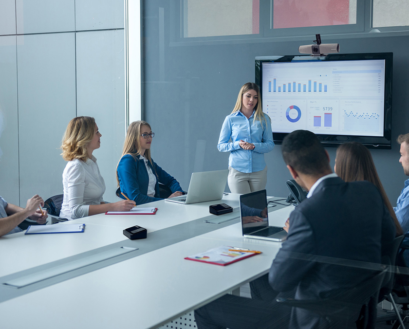 Up to 10 people can use the AVerMedia all-in-one video conferencing camera PA511D Mingle and the AW111 wireless expansion mic kit in a conference room.